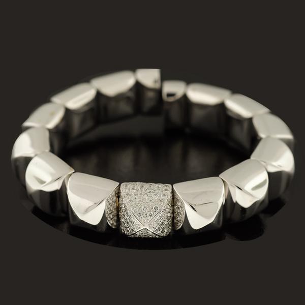 18KY 12MM PYRAMID CUFF. THE CENTER IS IN 18KWG WITH  1.76CTS. PAVE' SET DIAMONDS