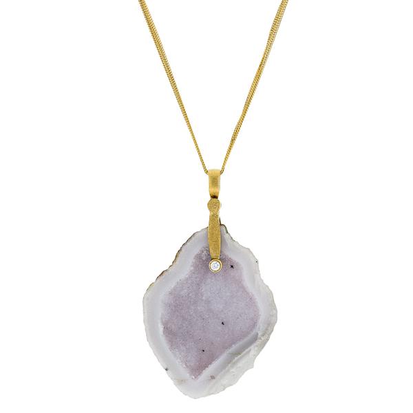18KT. YELLOW GOLD HAND TOOLED PENDANT WITH A WHITE BABY GEODE